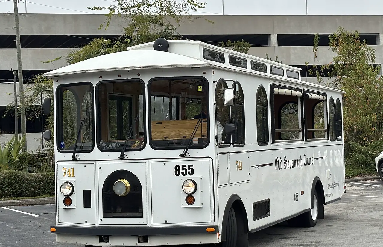 Old Town Trolley sightseeing bus on a brick street in Savannah’s Historic District