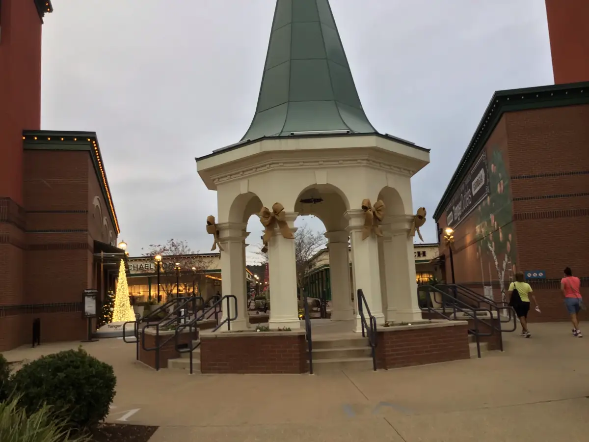 Entrance sign and storefronts at Tanger Outlets Savannah in Pooler
