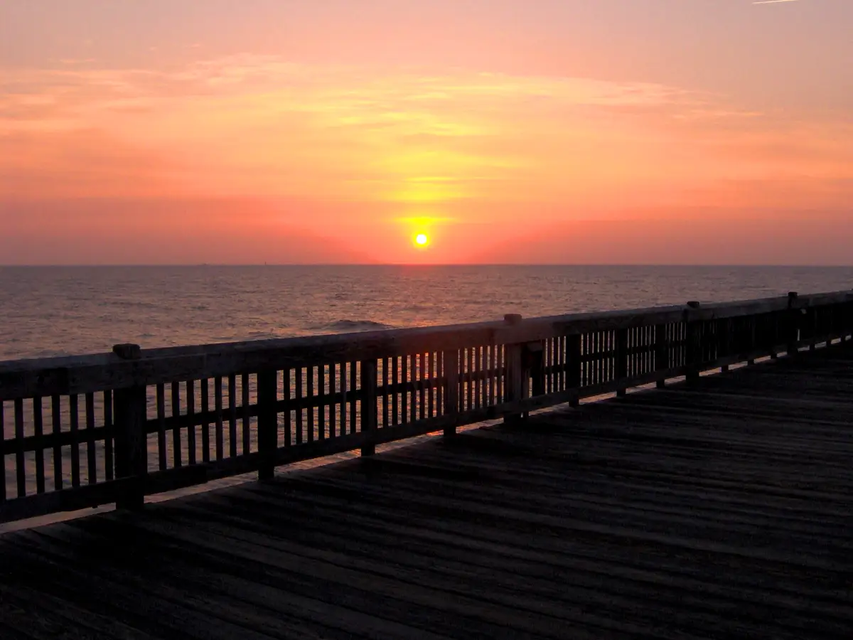 Sunrise from the Tybee Island pier, looking back toward the beach